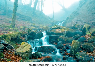 Beautiful waterfall in the forest in the gorbea natural park, Belaustegi, Basque Country