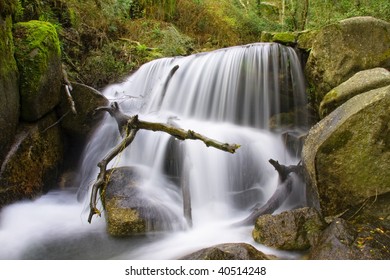 Beautiful waterfall in Portuguese forest, long exposure