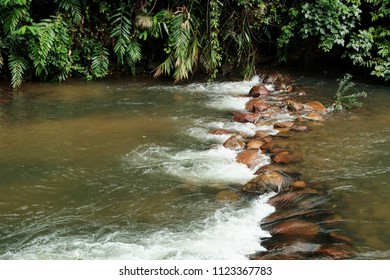 Beautiful waterfall trough the rocks in Chanthaburi province, Thailand. - Shutterstock ID 1123367783