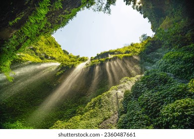 Beautiful waterfalls in sunny day,Bottom view Madakaripura Waterfall is the tallest waterfall in East Java, Indonesia - Powered by Shutterstock