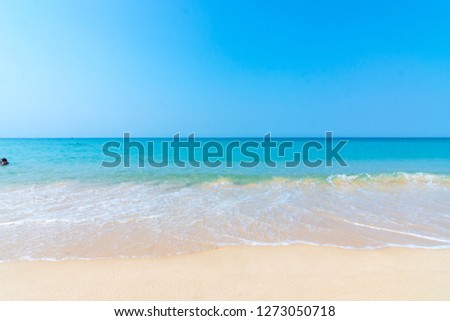 Beautiful wave on the beach, clear water, white sand in your holliday at andaman sea Phuket Thailand.