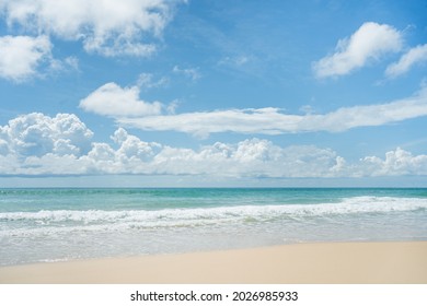 Beautiful Wave Soft Blue Breaking Empty Beach.Amazing Wave On Clean Sandy Surfing  Beach.Landscape Wave Pattern Sunset On Summer.Waves Sea Water Crashing Beach Texture Background.Close Up No People.