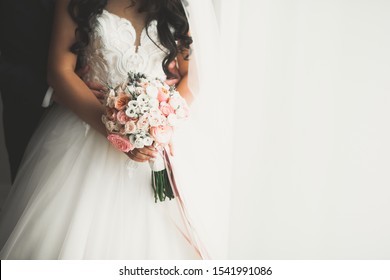 Beautiful wedding bouquet with different flowers, roses.