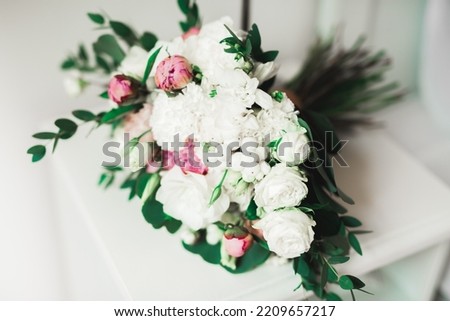 Beautiful wedding bouquet with different flowers, roses