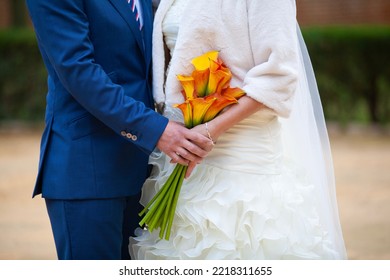 Beautiful wedding bouquet in hands of the bride - Shutterstock ID 2218311655