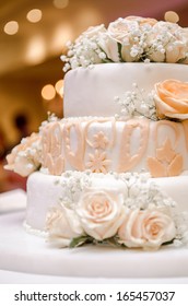 Beautiful Wedding Cake Decorated With Orange Roses