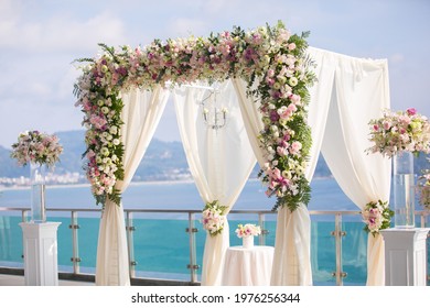 Beautiful wedding ceremony at a destination wedding by the beach.