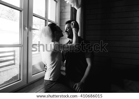 Similar – Young couple in love are posing face to face