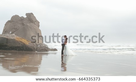 Similar – Image, Stock Photo Couple looking at the sea