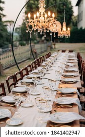 Beautiful Wedding Decor For Dinner With Candles And Chandeliers On A Villa In Tuscany