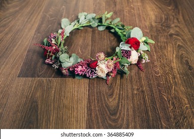 Beautiful Wedding Red Rose Flower Crown On Wooden Background