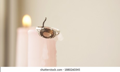  Beautiful Wedding Ring And Candles, Space For Text. The Concept Of Lost Love                              