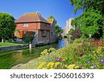 Beautiful Westgate Gardens with flowers and medieval tower in historic Canterbury, Kent, England