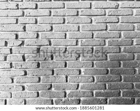 Beautiful white bricks pattern on the wall. It’s modern and clean texture. Premium loft style.
