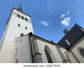 Beautiful white building of St Olaf’s church on a sunny August afternoon. Tallinn, Estonia. August 21st 2022