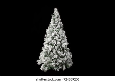 Beautiful white christmas tree isolated on a black background