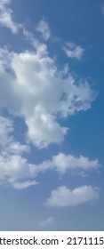 Beautiful White Clouds On Deep Blue Sky Background. Elegant Blue Sky Picture In Daylight. Large Bright Soft Fluffy Clouds Are Cover The Entire Blue Sky. Cumulus Clouds In Clear Blue Sky. No Focus