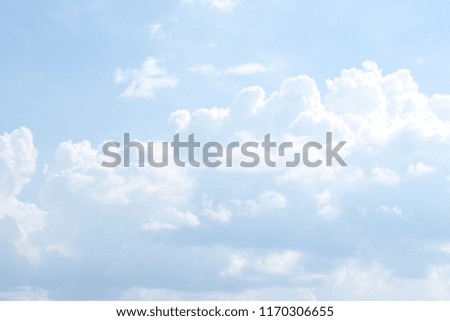 Beautiful white fluffy clouds on a blue sky day