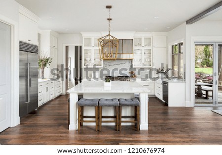 Similar – Image, Stock Photo Bright modern kitchen with wooden floor and white cabinets