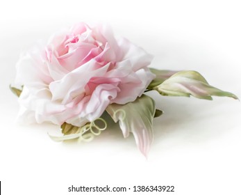 Beautiful white pink flower rose on white background. Flowering open head of rose with green leaves. Close-up rose petals. Side View - Shutterstock ID 1386343922