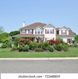 Beautiful White Suburban McMansion Home Blue Sky USA