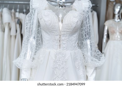 Beautiful White Wedding Dress On Mannequin In Trendy Bridal Show Room 