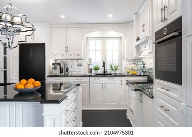 Beautiful, White, Wooden Kitchen With Large Island