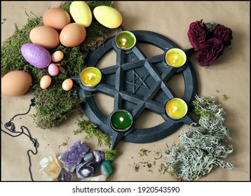 Beautiful Wiccan Altar for Ostara Sabbath made of pentagram candle holder, moss, eggs, green fluorite pendant