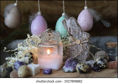 Beautiful Wiccan Altar for Ostara Sabbath made of coloured eggs, amethyst stones and wooden hare