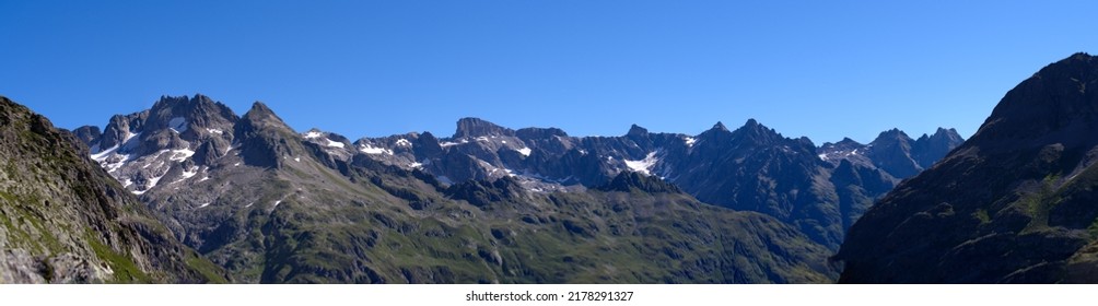 Beautiful wide angle mountain panorama at Swiss mountain pass Sustenpass on a sunny summer day. Photo taken July 13th, 2022, Susten Pass, Switzerland. - Shutterstock ID 2178291327