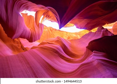 Beautiful wide angle view of amazing sandstone formations in famous Antelope Canyon on a sunny day in the morning near the old town of Page at Lake Powell, American Southwest, Arizona, USA - Powered by Shutterstock