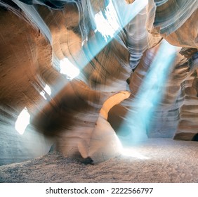 Beautiful wide angle view of sandstone formations in famous Antelope Canyon on a sunny day filtering light rays, Page, American Southwest, Arizona, USA. - Powered by Shutterstock