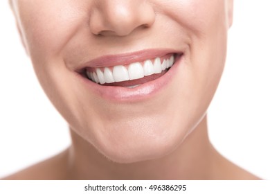 Beautiful wide smile of young woman. Closeup photo. - Shutterstock ID 496386295