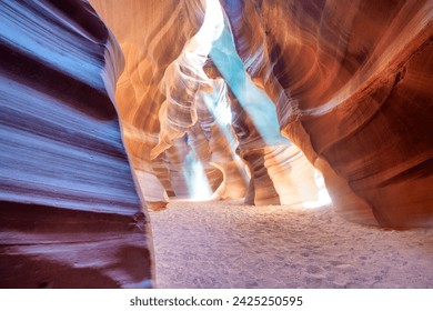 Beautiful wide-angle view of incredible sandstone formations in famous Antelope Canyon on a sunny day, American Southwest, Arizona, USA. - Powered by Shutterstock