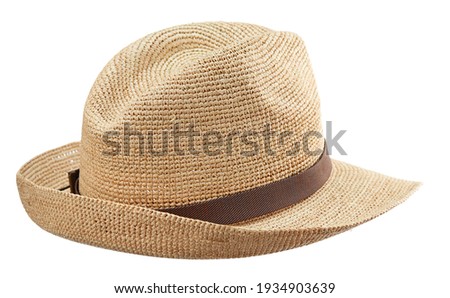Beautiful wide-brimmed wicker hat fedora woven from straw, isolated on a white background. Rear view.