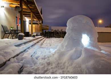 Beautiful Winter Garden Terrace With Snow Igloo At Night. Poland