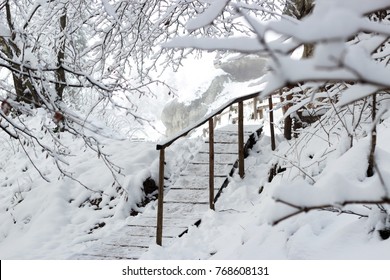 Beautiful Winter Landscape Of Carpathians With Spruce Forest And Wooden Stairs Covered With Snow, Horizontal Winter Outdoor, No People, Selective Focus