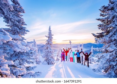 Beautiful winter landscape with forest snow in mountains with team of friends snowboarders and skiers sunrise. - Powered by Shutterstock