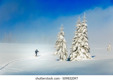 Beautiful winter mountain landscape and snowy with skier.