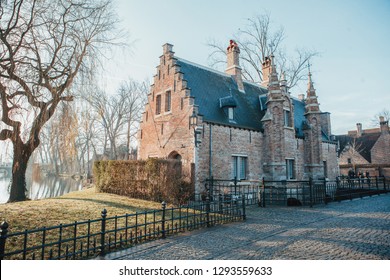 Beautiful Winter Sunrise On The Old European Streets. Bruges, Belgium 