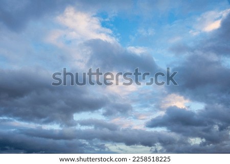 Beautiful Winter sunset evening colorful vibrant dramatic sky for use as a background