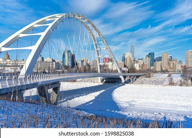 Beautiful winter view of Walterdale suspension bridge and the downtown skyline in Edmonton,
