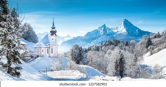 Beautiful winter wonderland mountain scenery in the Alps with pilgrimage church of Maria Gern and famous Watzmann summit in the background, Berchtesgadener Land, Bavaria, Germany - Powered by Shutterstock