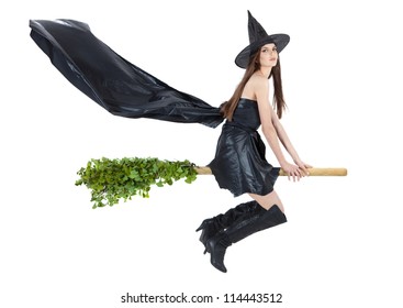 Beautiful Witch Flying On Broomstick With Cape