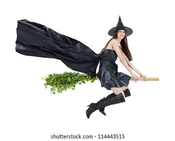 Beautiful Witch Flying On Broomstick With Cape