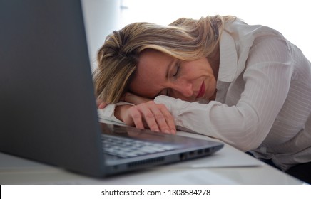Beautiful Woman, After A High Workload, Sleeping In The Office At Work.