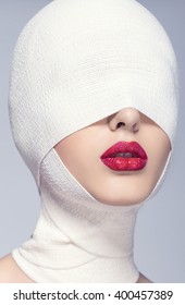 Beautiful Woman After Plastic Surgery With Bandaged Face