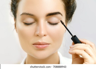 Beautiful Woman Is Applying Tinted Eyebrow Gel