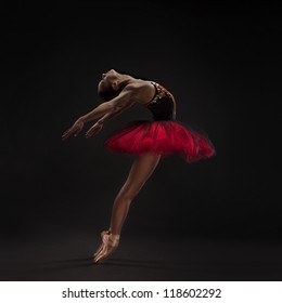 Beautiful Woman Ballet Dancer Isolated On Studio Black Background