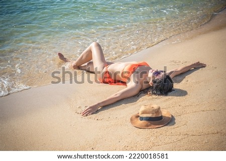 beautiful woman in bikini by the sea.Koh Ma Beach.Koh Phangan.